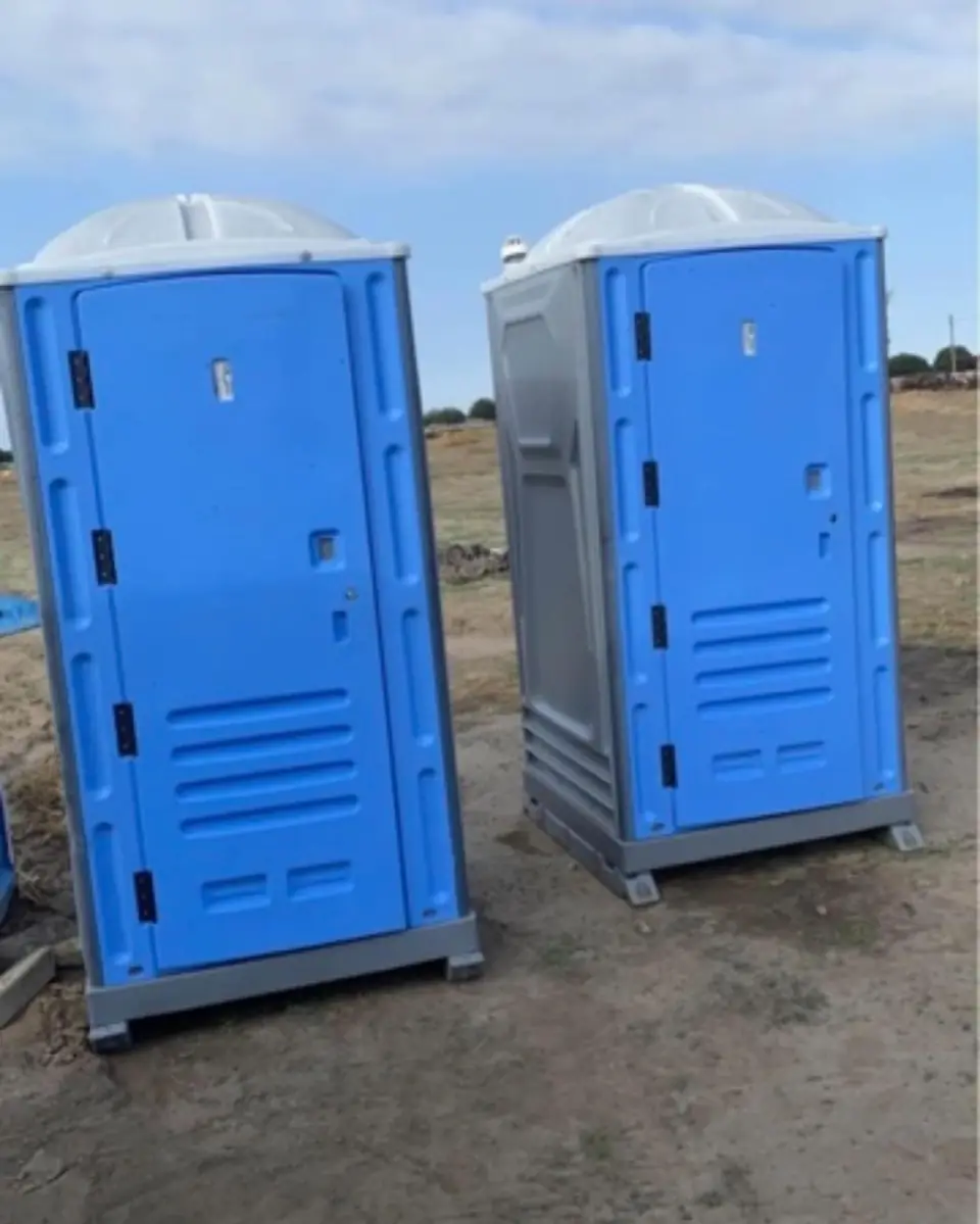 Two standard blue porta potties